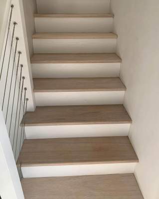 Treads sanded and finished, painted rises 